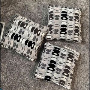 Gray patterned throw pillows